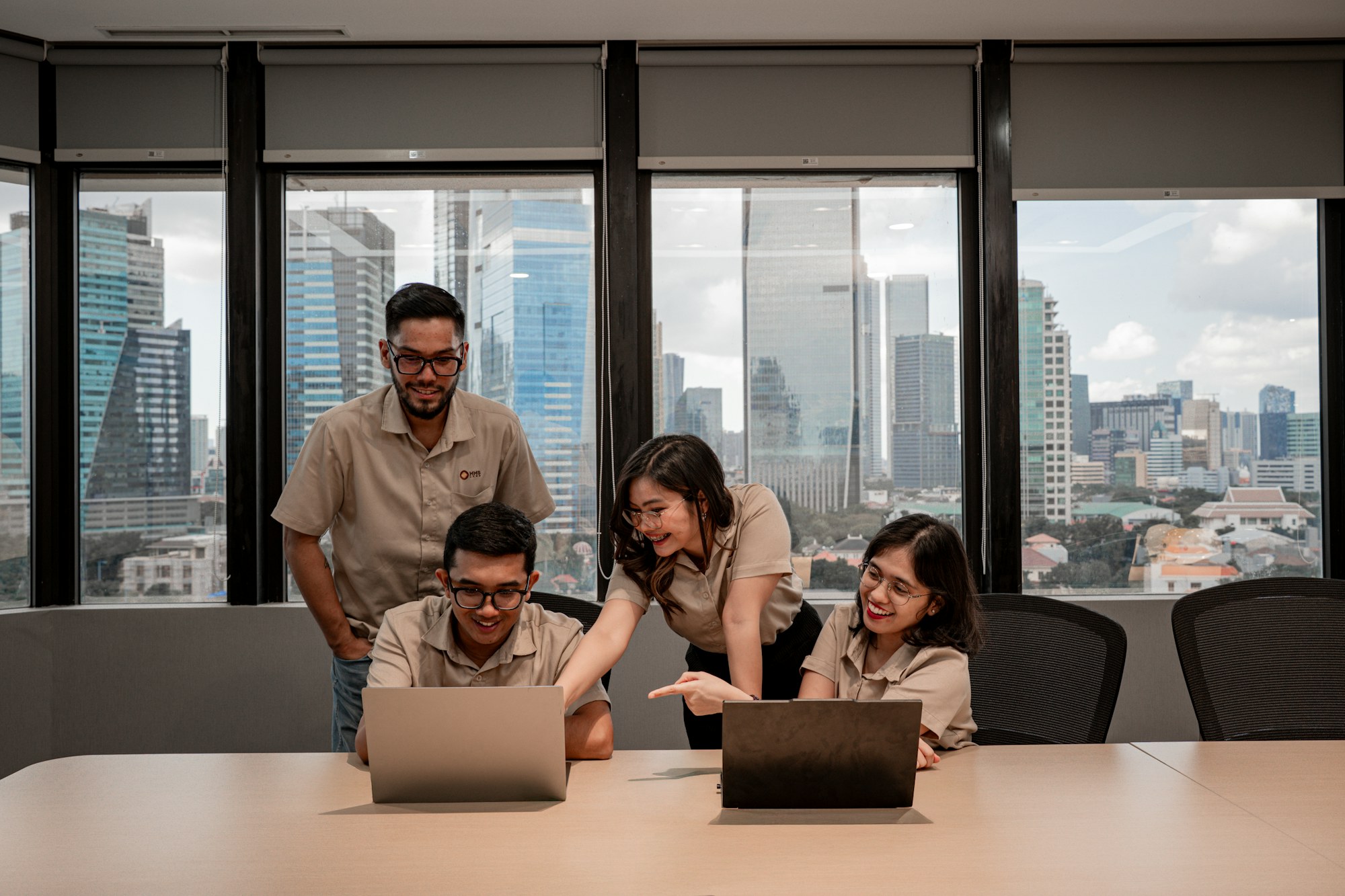 Colleagues working together around a table